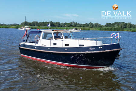 LANGENBERG CABIN CRUISER 880 width=
